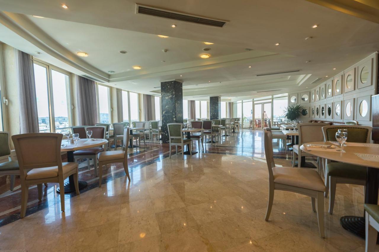 โรงแรมซันไรส์ อเล็กซ์ อเวนิว อเล็กซานเดรีย ภายนอก รูปภาพ The restaurant