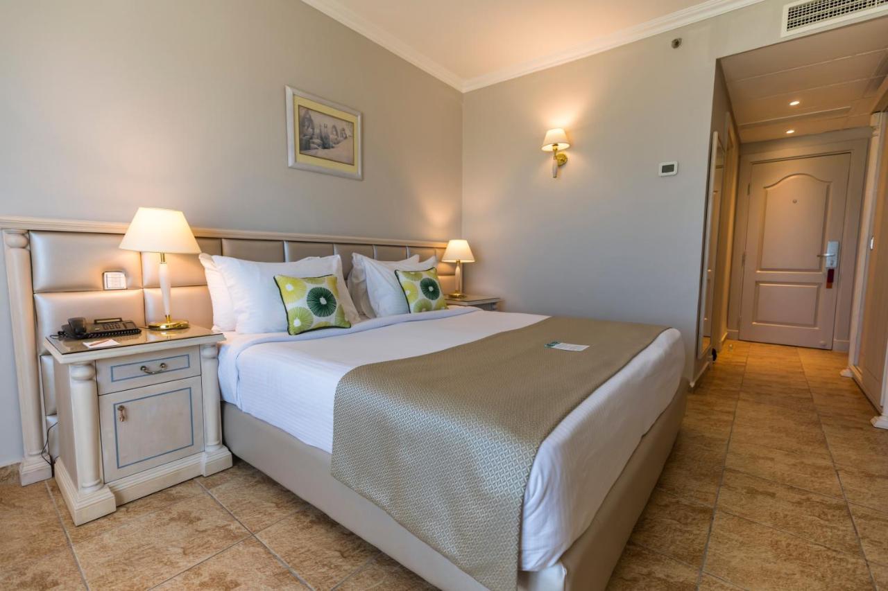 โรงแรมซันไรส์ อเล็กซ์ อเวนิว อเล็กซานเดรีย ภายนอก รูปภาพ A room at the hotel