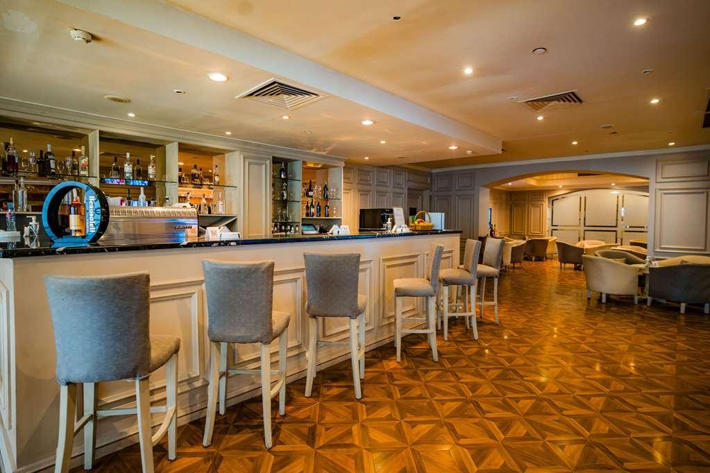 โรงแรมซันไรส์ อเล็กซ์ อเวนิว อเล็กซานเดรีย ภายใน รูปภาพ The bar at the 1900 restaurant