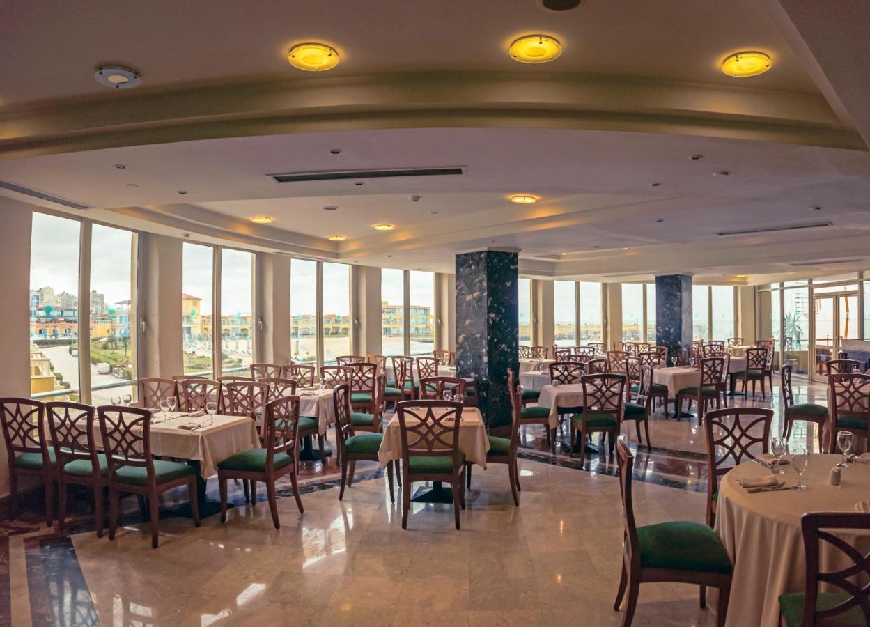 โรงแรมซันไรส์ อเล็กซ์ อเวนิว อเล็กซานเดรีย ภายนอก รูปภาพ The restaurant